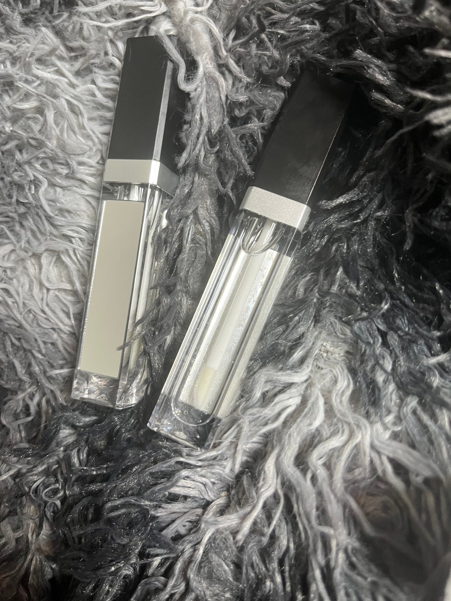 Limited edition classy ! Black top Clear gloss with a built in mirror and light